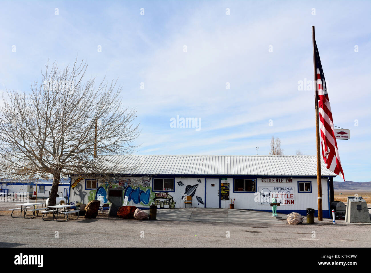 Rachel, Nevada, United States of America - November 21, 2017. Exterior view of Little A'Le'Inn hotel in Rachel, Nevada, with American flag, commercial Stock Photo