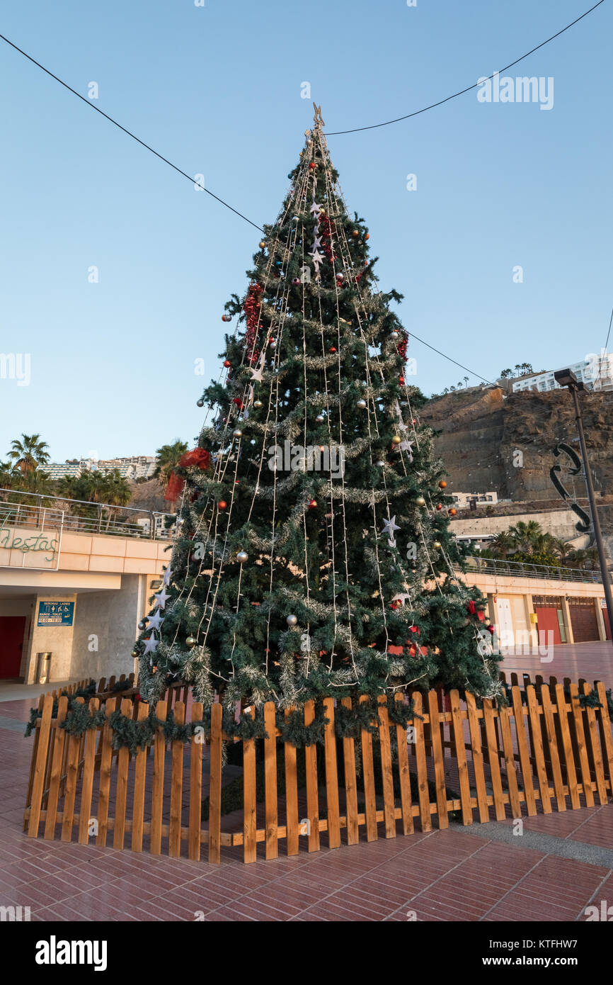 Christmas tree standing at Playa de Amadores beach on Gran Canaria island in Spain. Stock Photo