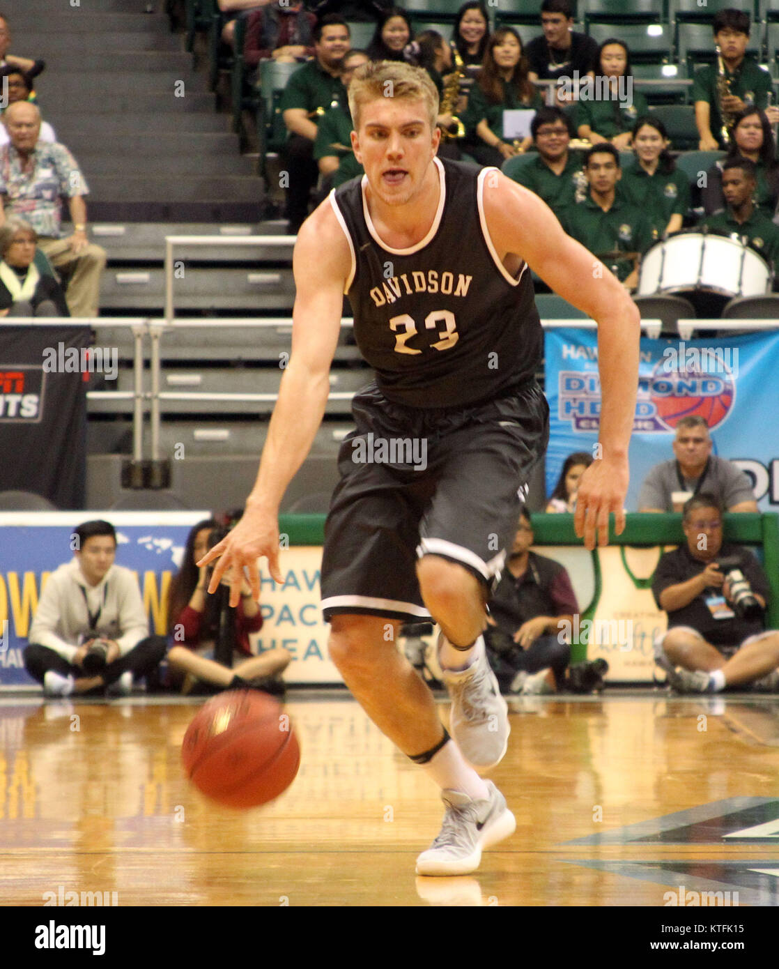 December 23, 2017 - Davidson Wildcats forward Peyton Aldridge (23) dribbles during game between Davidson Wildcats and the Hawaii Rainbow Warriors at the Hawaiian Airlines Diamond Head Classic at the Stan Sheriff Center on the campus of the University of Hawaii in Honolulu, Hawaii - Michael Sullivan/CSM Credit: Cal Sport Media/Alamy Live News Stock Photo