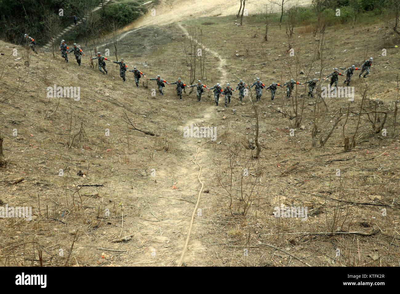 Beijing, China. 22nd Dec, 2017. Chinese soldiers conduct demining mission in the Guangxi section along the China-Vietnam border in south China's Guangxi Zhuang Autonomous Region Dec. 22, 2017. Credit: Guan Lei/Xinhua/Alamy Live News Stock Photo