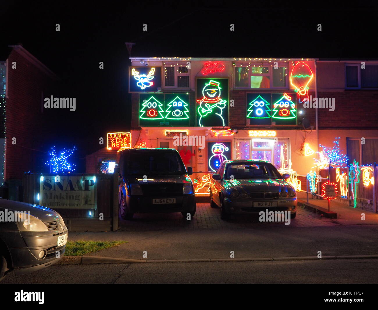 Minster on sea, Kent, UK. 24th Dec, 2017. A colourful Christmas lighting display on a house in Minster on sea. Donations are given to the Kent based SNAAP charity for disabled children. Credit: James Bell/Alamy Live News Stock Photo