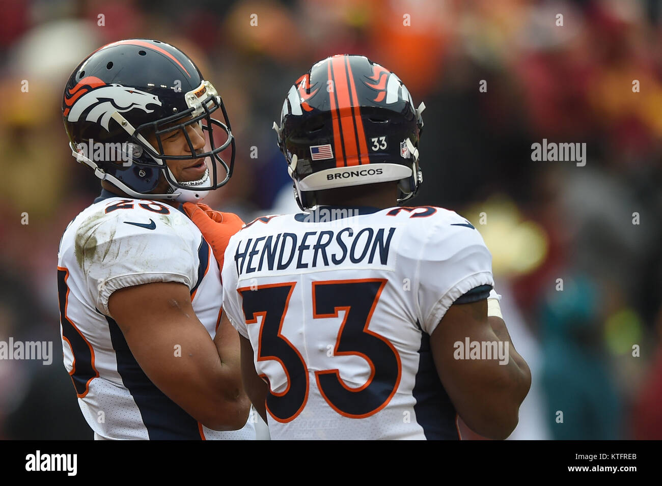 Landover, MD, USA. 24th Dec, 2017. Denver Broncos running back Devontae Booker (23) and running back De'Angelo Henderson (33) wait for a kickoff during the season ending home matchup between the Denver Broncos and the Washington Redskins at FedEx Field in Landover, MD. Credit: csm/Alamy Live News Stock Photo