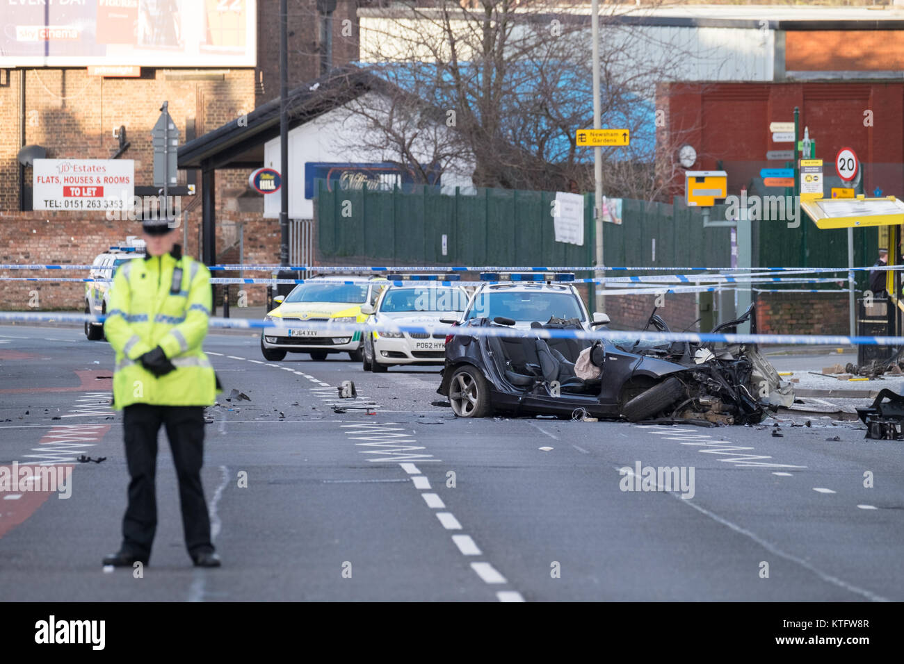 Liverpool, UK. 25 Dec, 2017. A man in his 30s has died after a crash in the early hours of Monday, December 25, 2017. The car was involved in a Police pursuit prior to the crash, which happened at 4:35am on Prescot Road in the Old Swan area of Liverpool. The driver was detained by Police at the scene. The spokesperson for Merseyside Police confirmed that the incident has been referred to the Independent Police Complaints Commission. Credit: Christopher Middleton/Alamy Live News Stock Photo