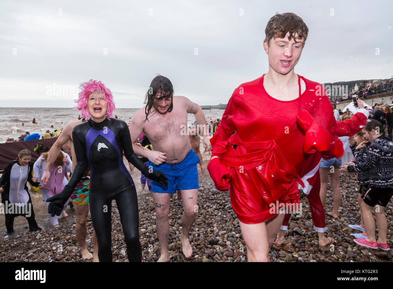 Sidmouth, Devon, UK. 26th Dec, 2017. Hundreds braved the freezing cold sea to join the annual Boxing Day swim at Sidmouth Devon. Credit: Photo Central/Alamy Live News Stock Photo
