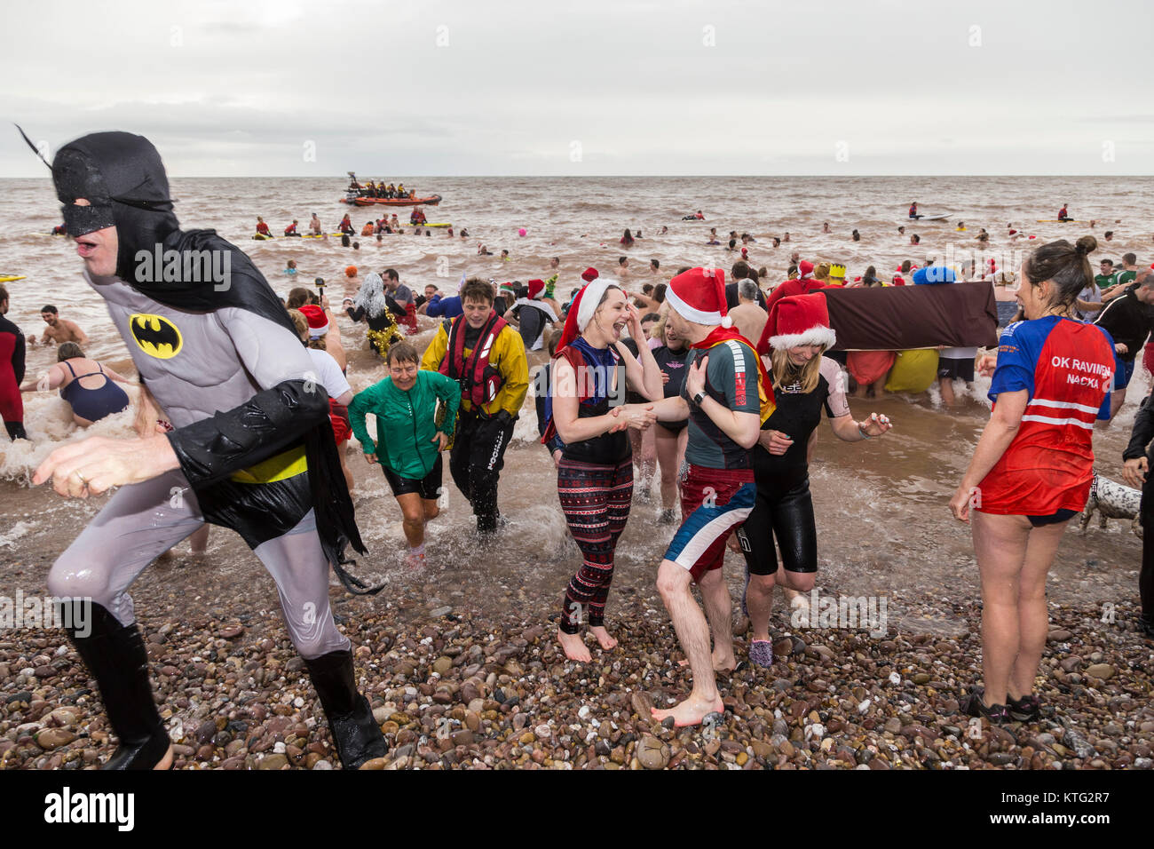 Sidmouth, Devon, UK. 26th Dec, 2017. Hundreds braved the freezing cold sea to join the annual Boxing Day swim at Sidmouth Devon. Credit: Photo Central/Alamy Live News Stock Photo