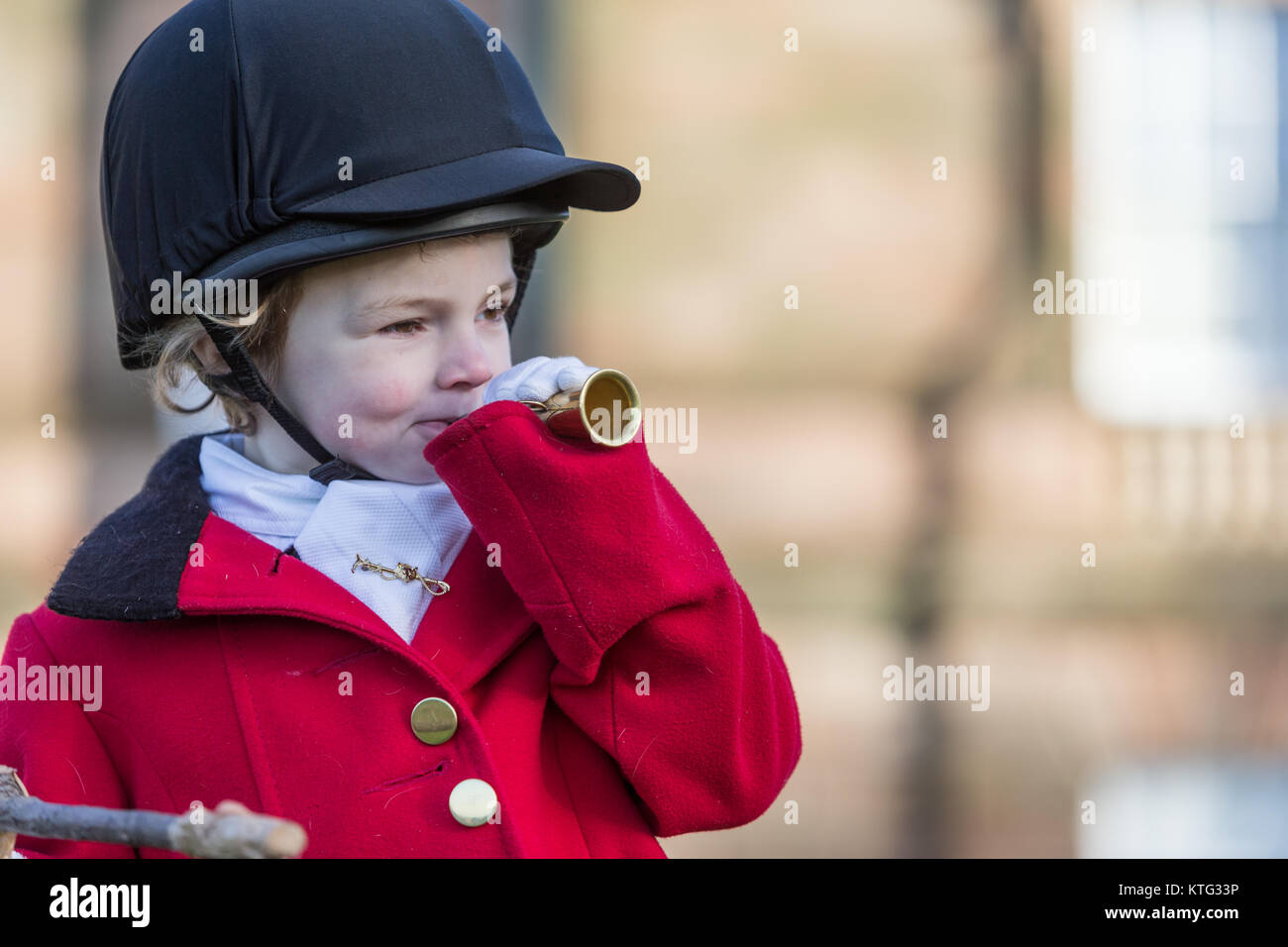 Four-year-old boy dressed for a foxhunt meet UK Stock Photo