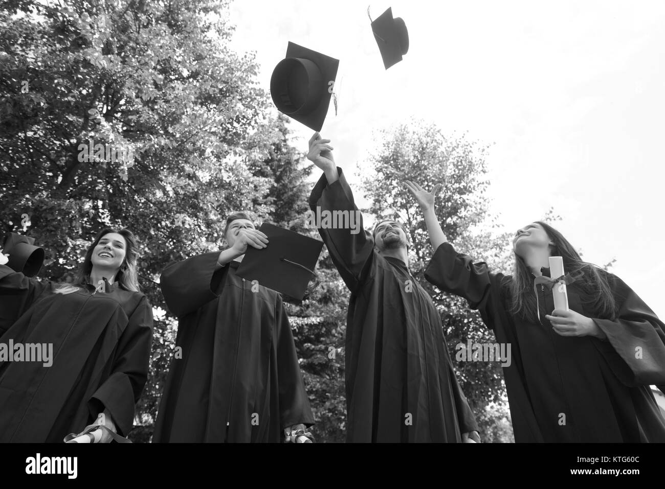 Graduation cap and gowns Black and White Stock Photos & Images - Alamy