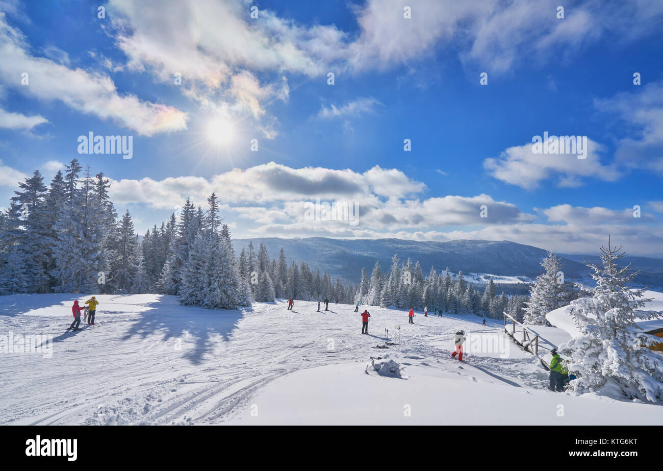mountain ski slope on a sunny day. Winter mountain landscape Stock Photo