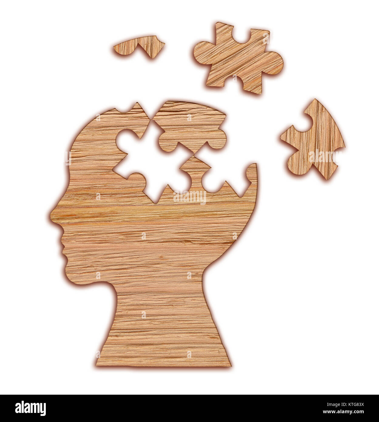 Human head silhouette with a jigsaw piece cut out on white background ...