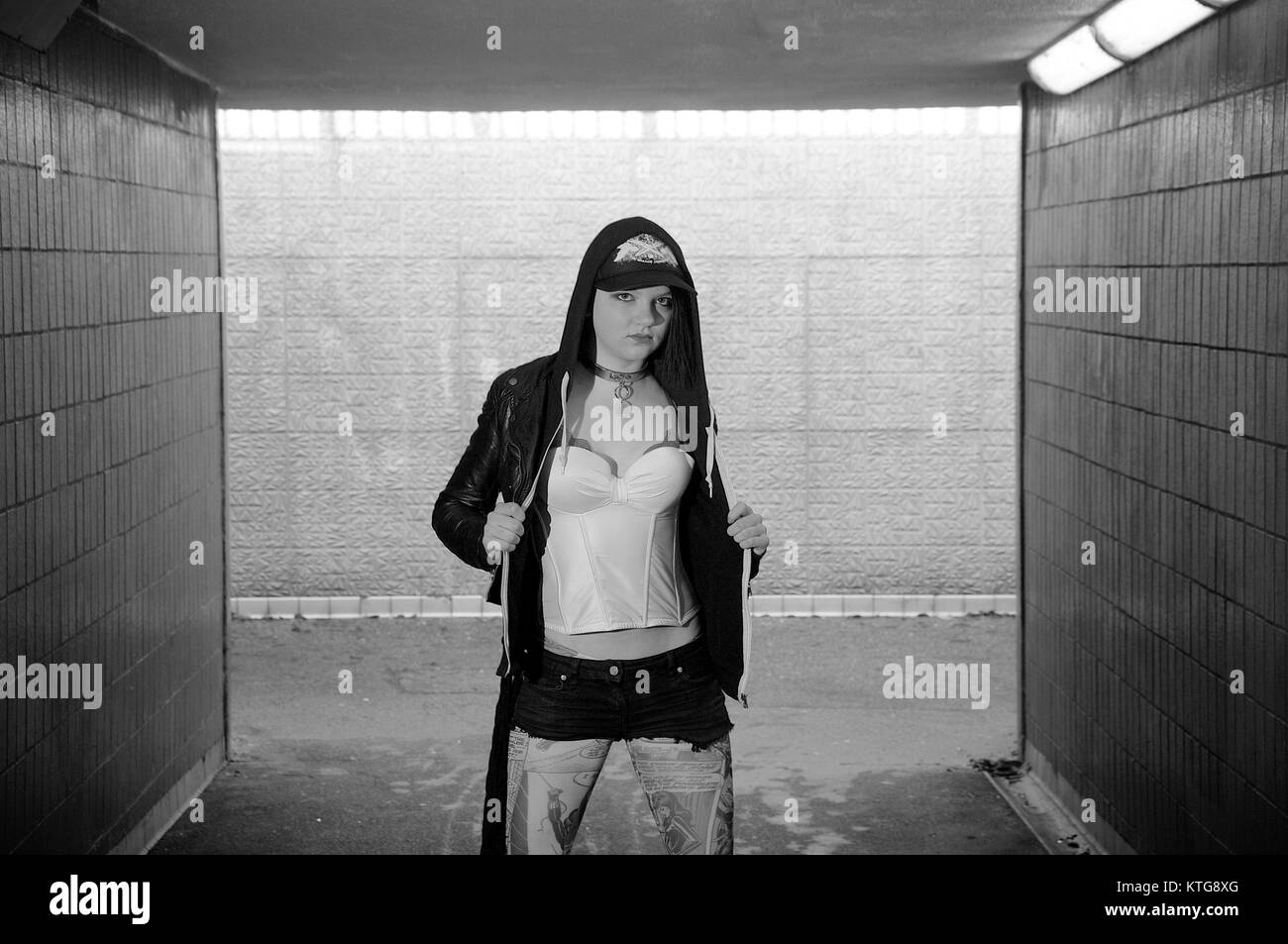 Pretty girl wearing alternative fashion in an underpass Stock Photo