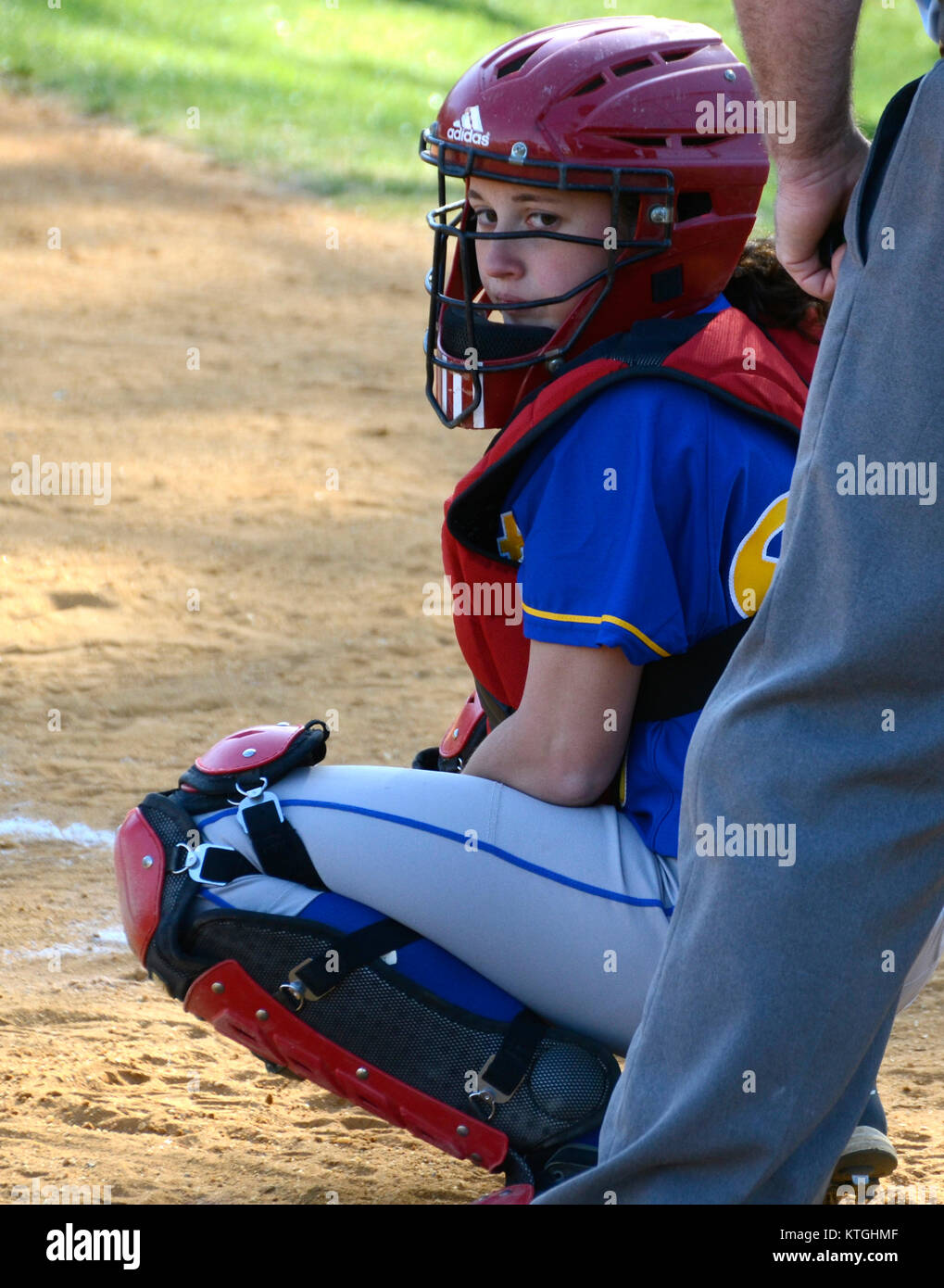 Catcher in a girls softball game Stock Photo