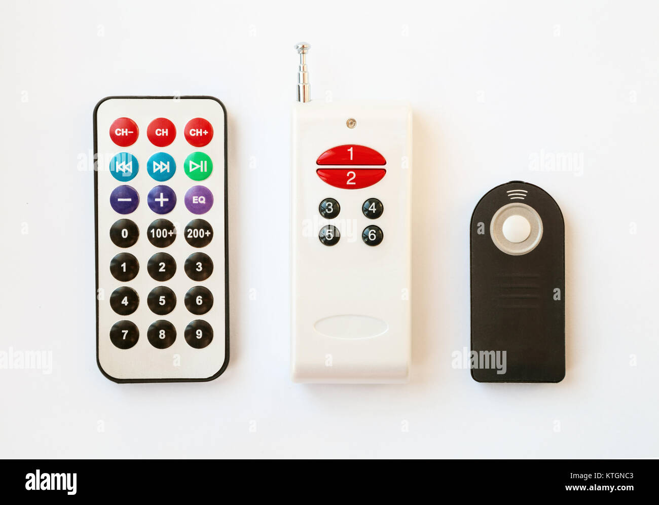 3 types of remote control with various number of buttons. Choice of three electronic home appliances remotes isolated on white Stock Photo