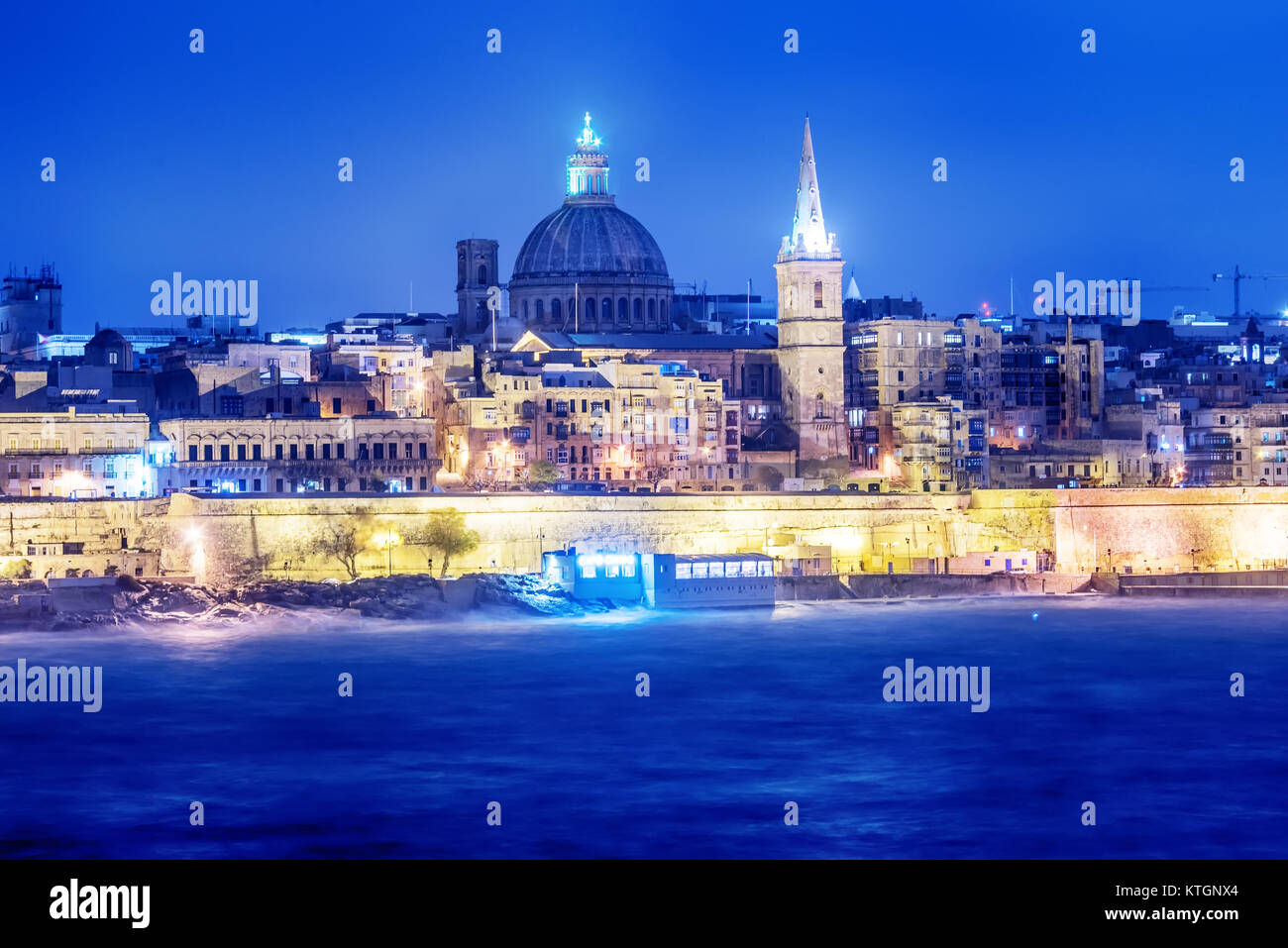 Valletta, Malta: skyline from Marsans Harbour at night Stock Photo