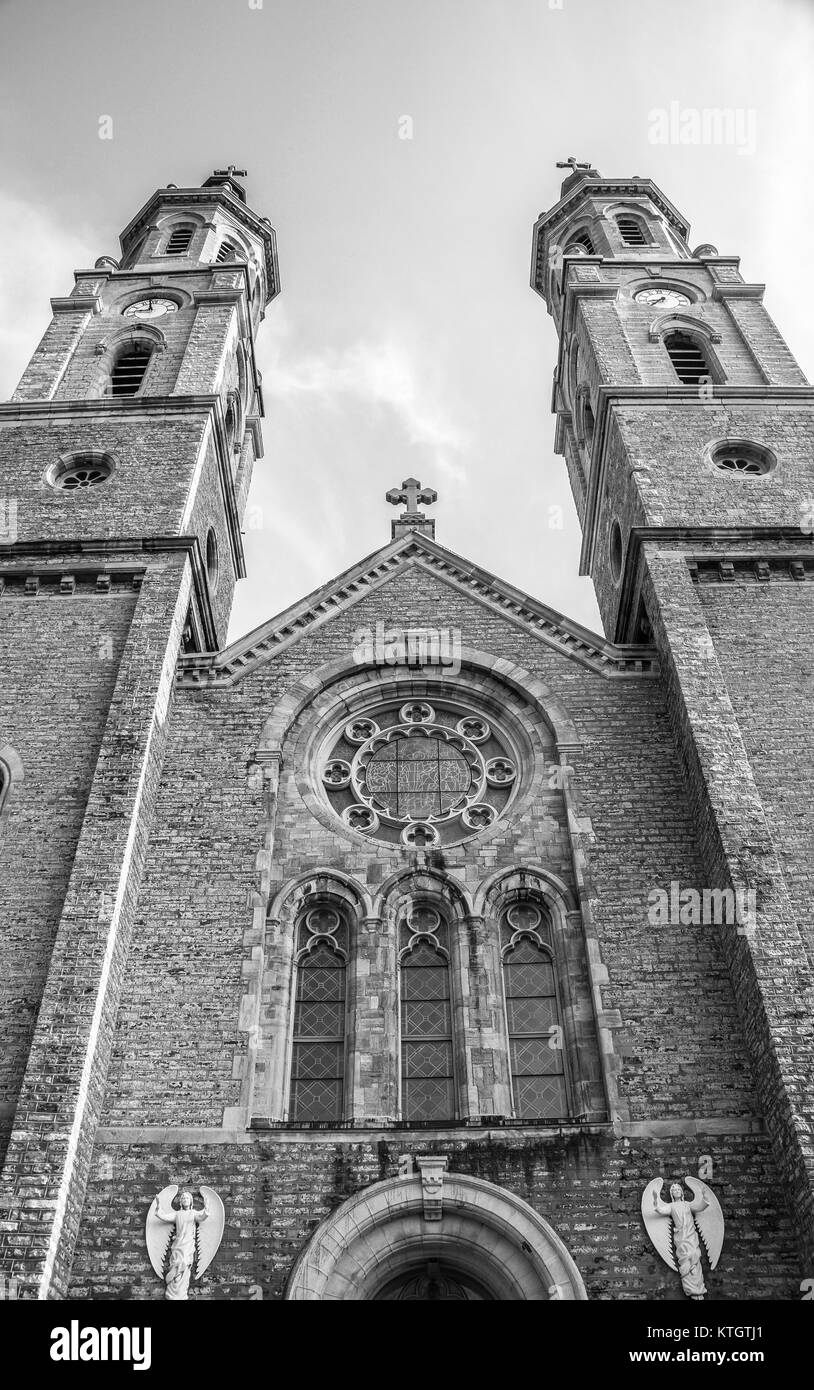 Black and white stock front of the Church of St. Stanislaus Bishop and Martyr named after Stanislaus of szczepanow in South Buffalo, New York Stock Photo
