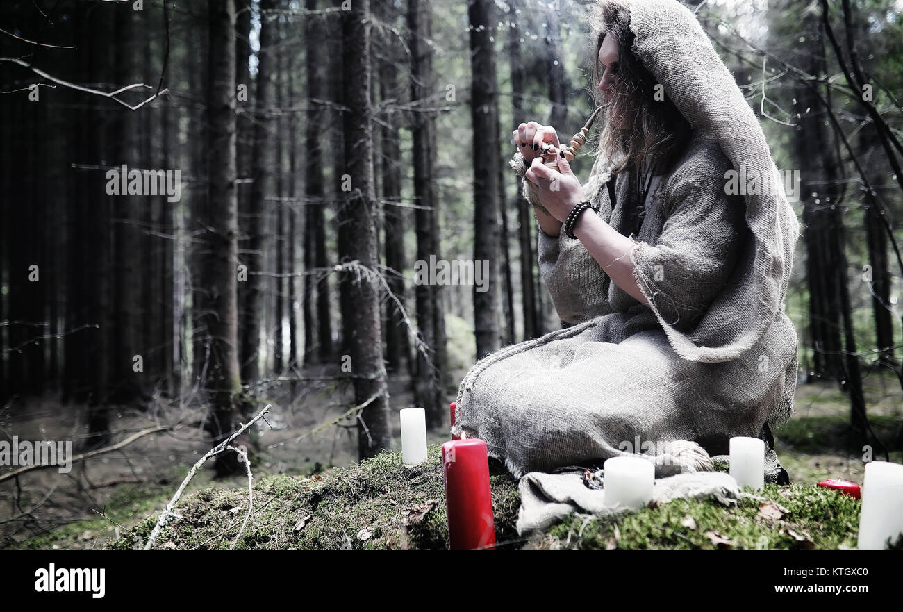 Fairy magician. A sorcerer with a glass sphere, a magical spell and a ...