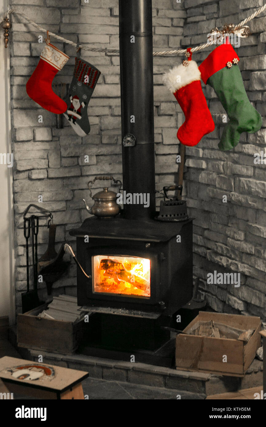 Christmas socks hanging on the fireplace Stock Photo Alamy
