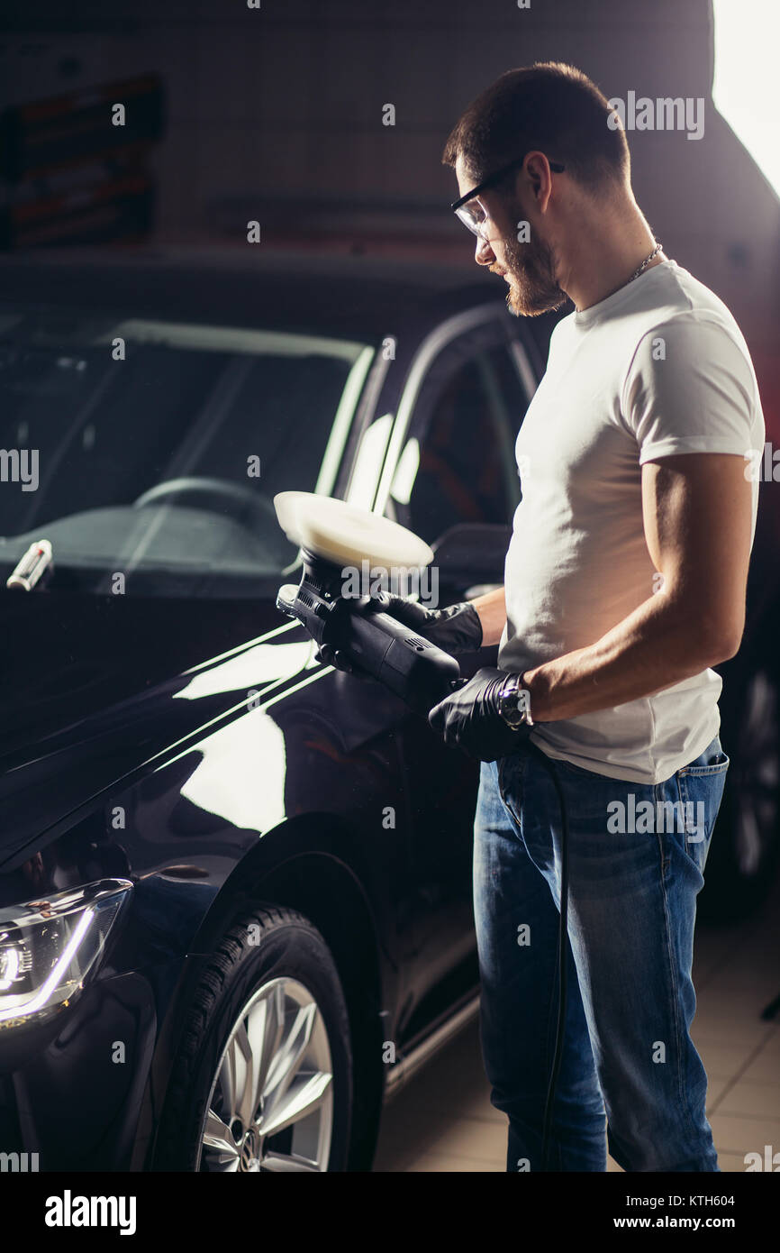 mechanic worker prepare for polishing car by power buffer machine Stock  Photo - Alamy