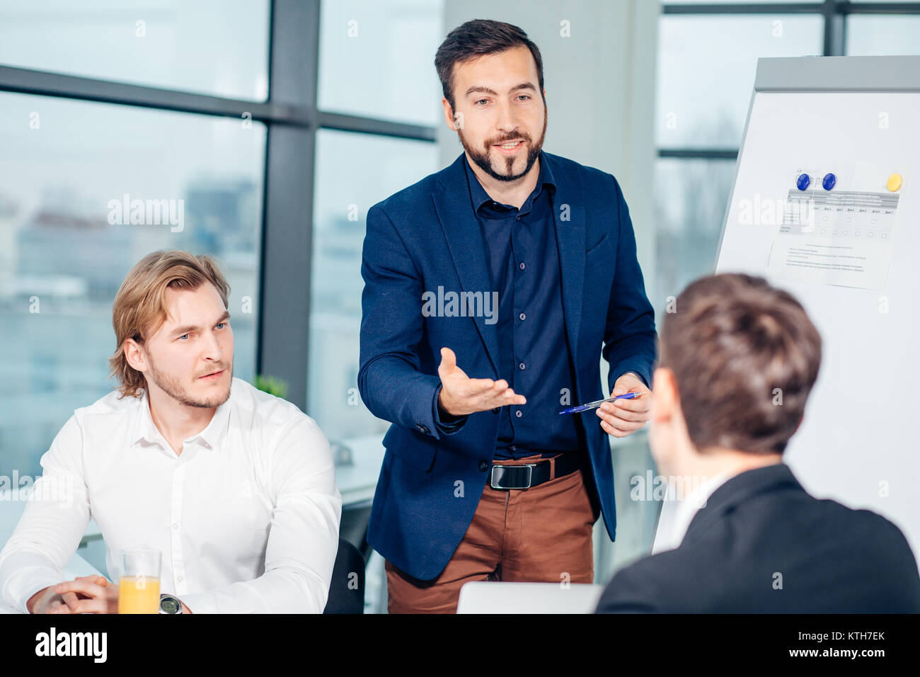 Successful business presentation of man at office Stock Photo