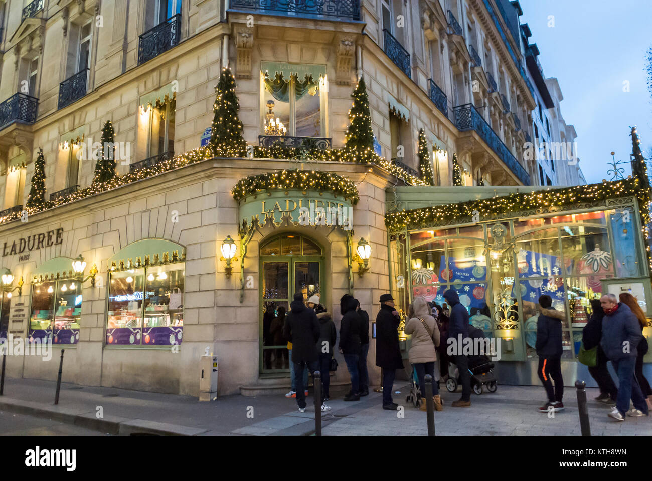 Paris, France, Tourists Visiting Avenue Champs Elysees, Christmas Shopping, Laduree Patisserie Shop and Cafe Restaurant, paris buildings Stock Photo