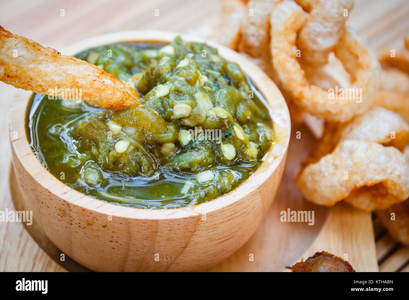Nam prik num (Northern Thai Green Chilli Dip) and Pork snack, thai food ...
