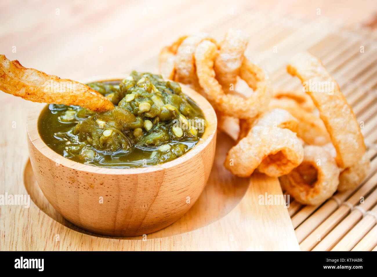 Nam prik num (Northern Thai Green Chilli Dip) and Pork snack, thai food ...