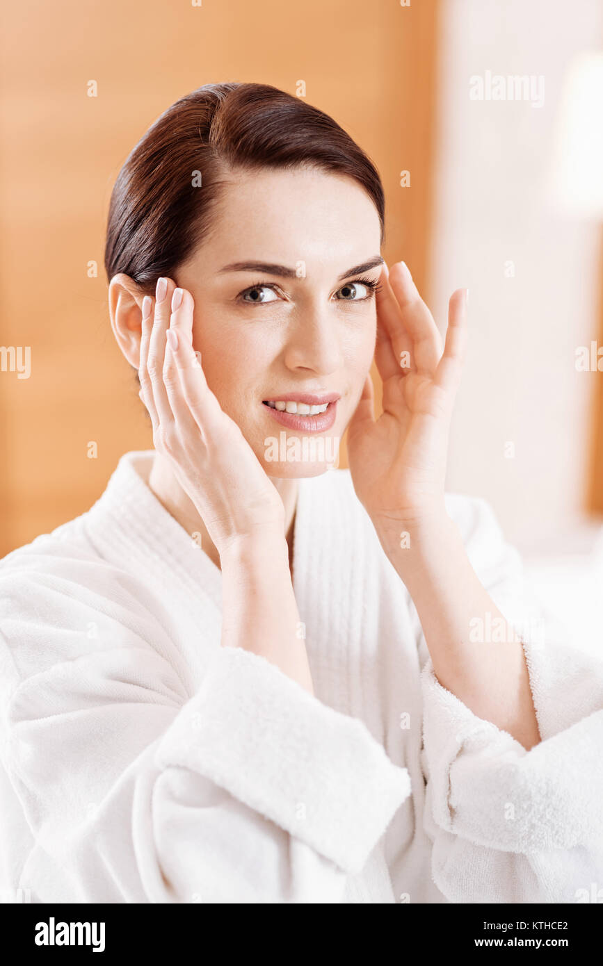 Woman portrait hands on temples hi-res stock photography and images - Alamy
