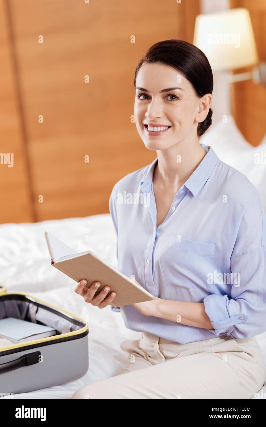 Happy energetic woman  checking her plans  Stock Photo