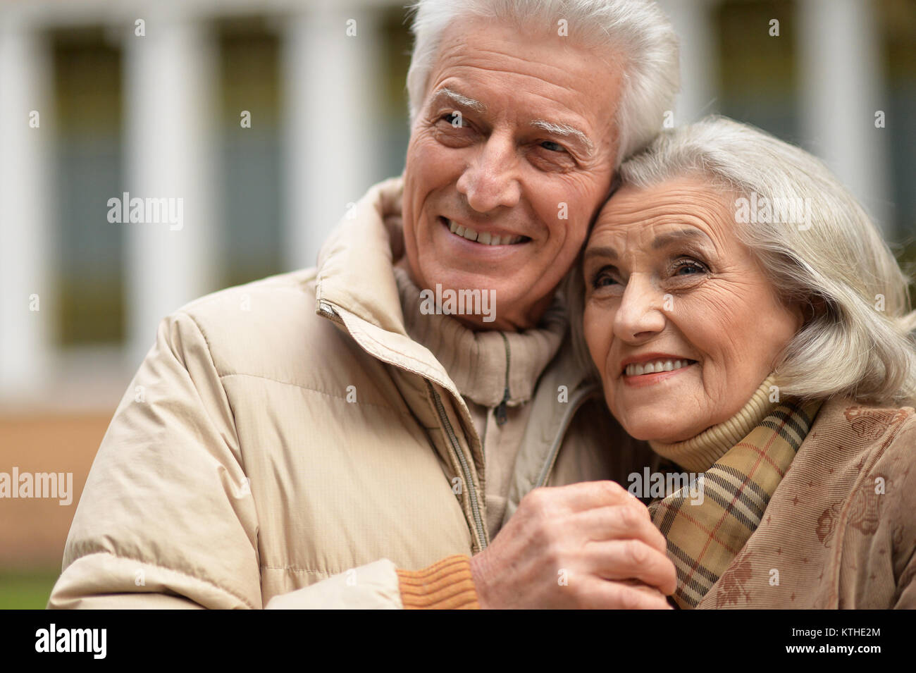 portrait of beautiful caucasian senior couple hugging in the park Stock ...