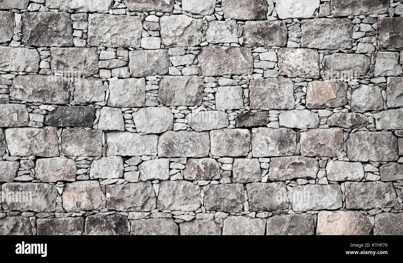 Old gray stone wall, flat background photo texture Stock Photo - Alamy