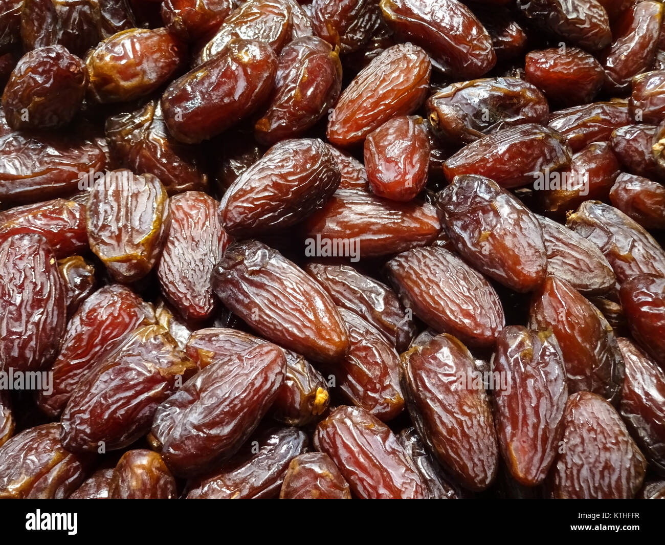 pile of dates , dried date fruits closeup Stock Photo