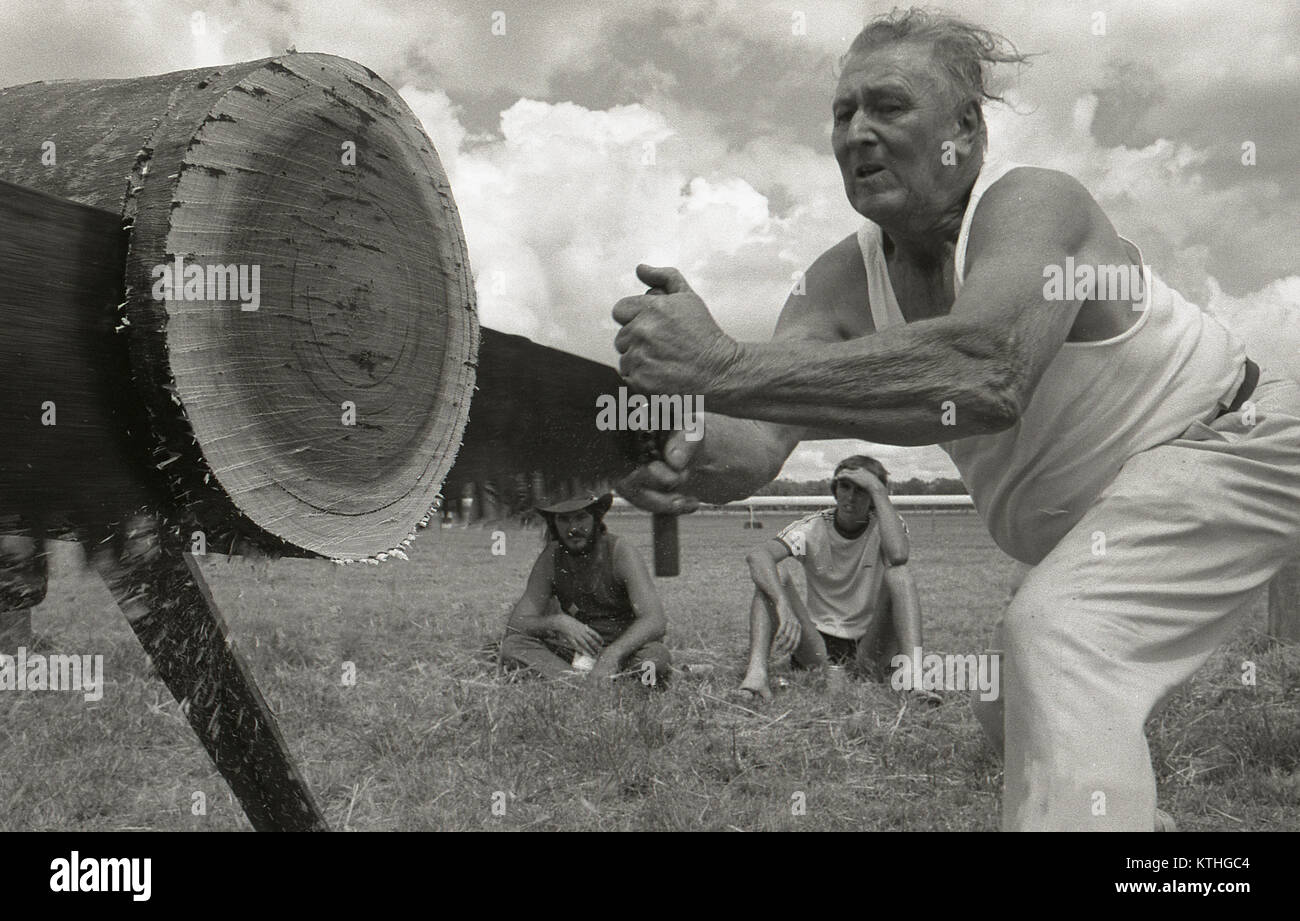 KINGAROY, AUSTRALIA, CIRCA 1979: Unidentified competitor reaches the end of the crosscut saw event during a small town agricultural show, circa 1979 in Kingaroy, Australia Stock Photo