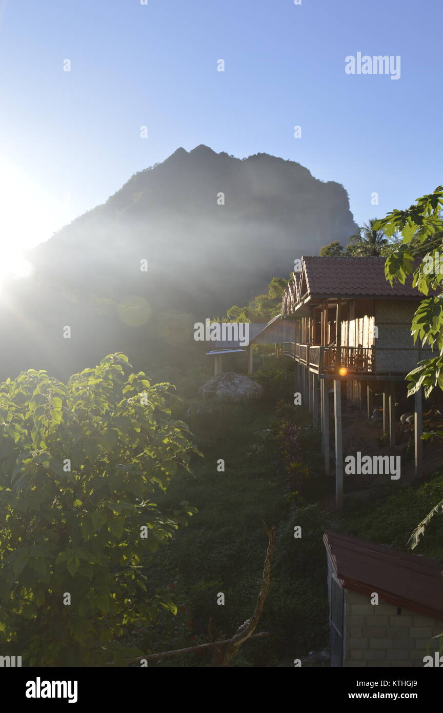 Beautiful wooden bamboo house on stilts on a mountain in countryside of