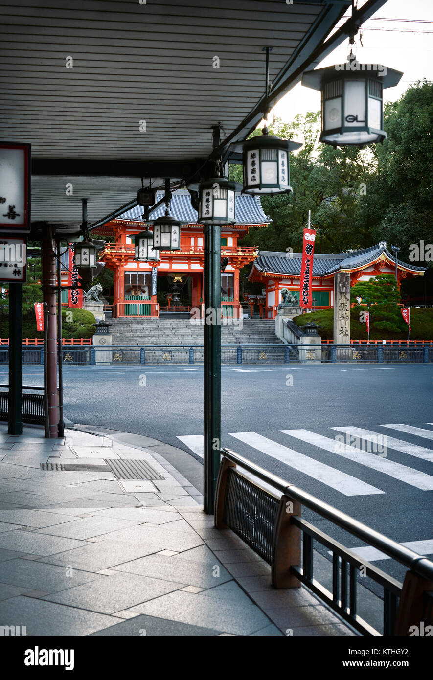 Yasaka shrine,Yasaka-jinja main gate view in morning sunrise from a sidewalk on Shijo dori street in Kyoto in Gion, Kyoto, Japan 2017 Stock Photo