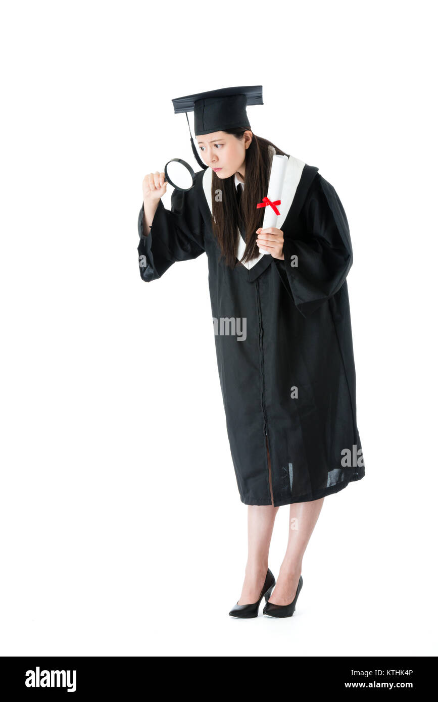 young attractive university female graduate standing on white ...