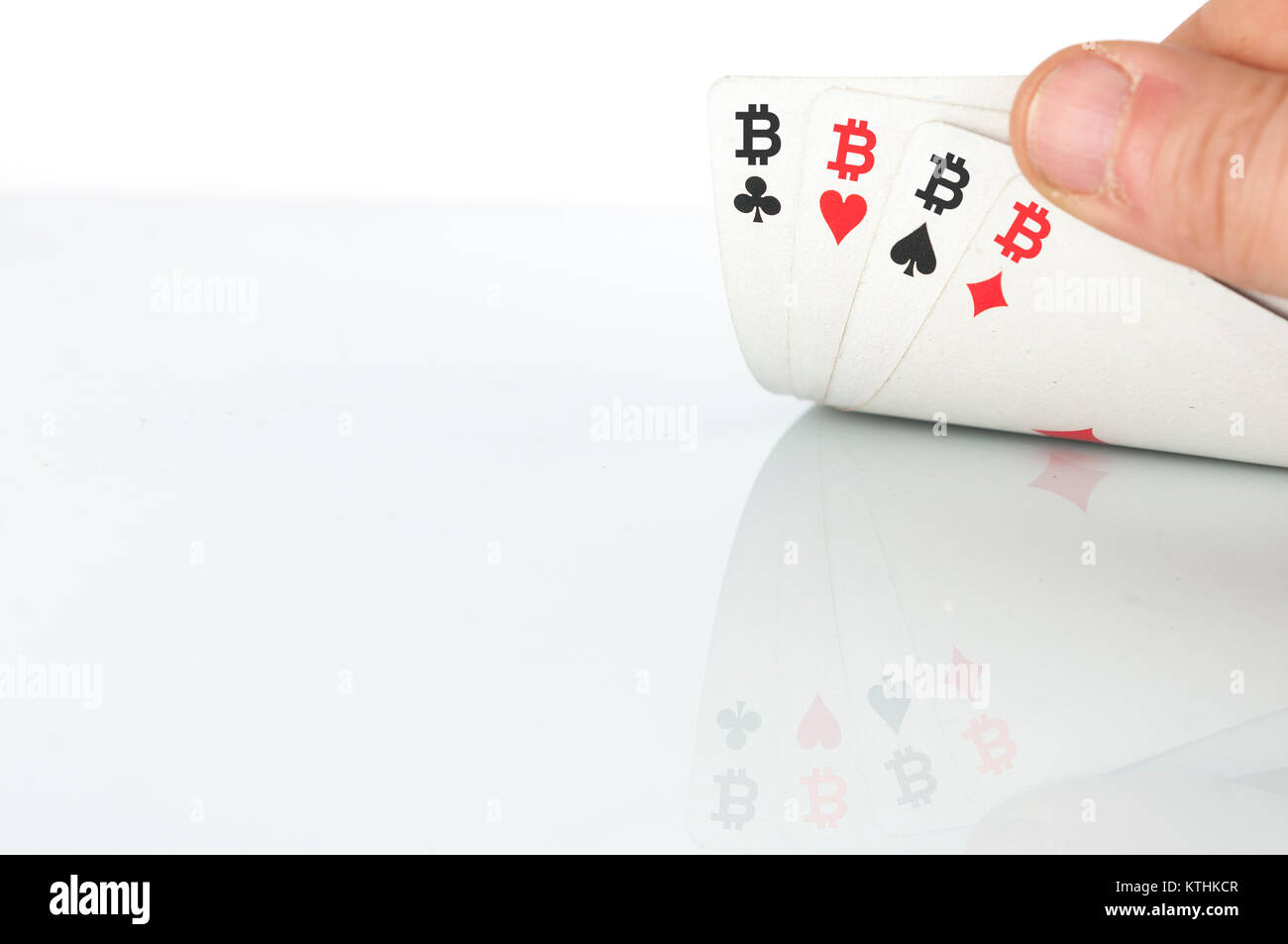 Bitcoin concept: four of a kind of bitcoin playing cards Stock Photo