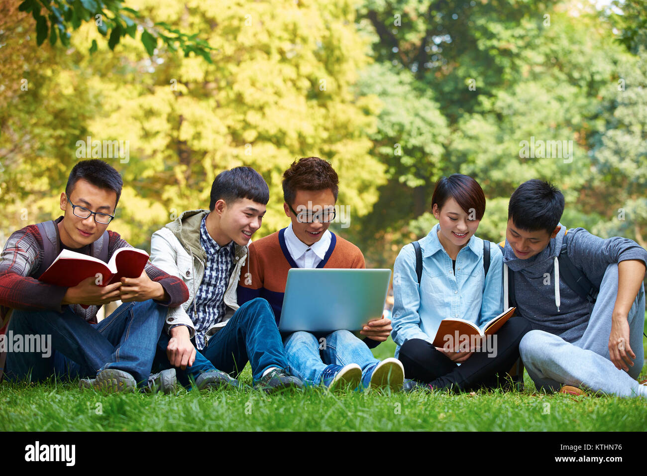 Asian students using computer group hi-res stock photography and images ...