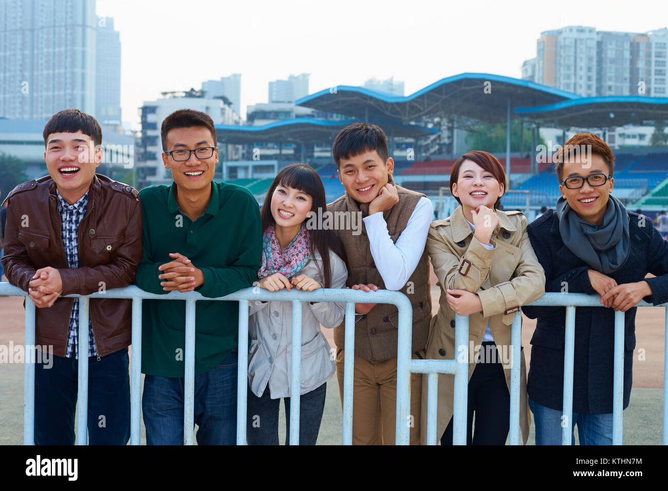 group of happy asian college students looking at camera smile in the ...