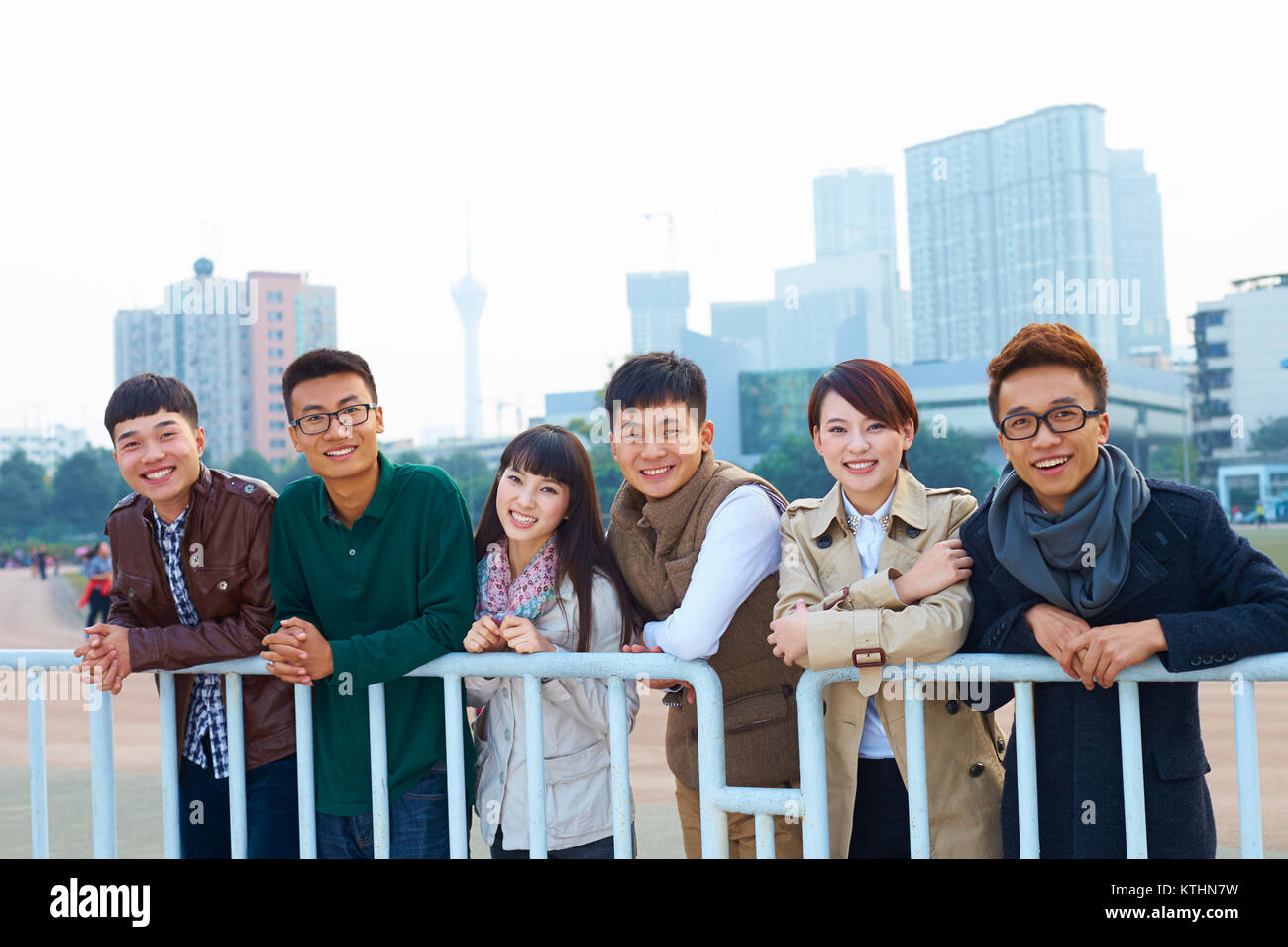 group of happy asian college students looking at camera smile in the ...