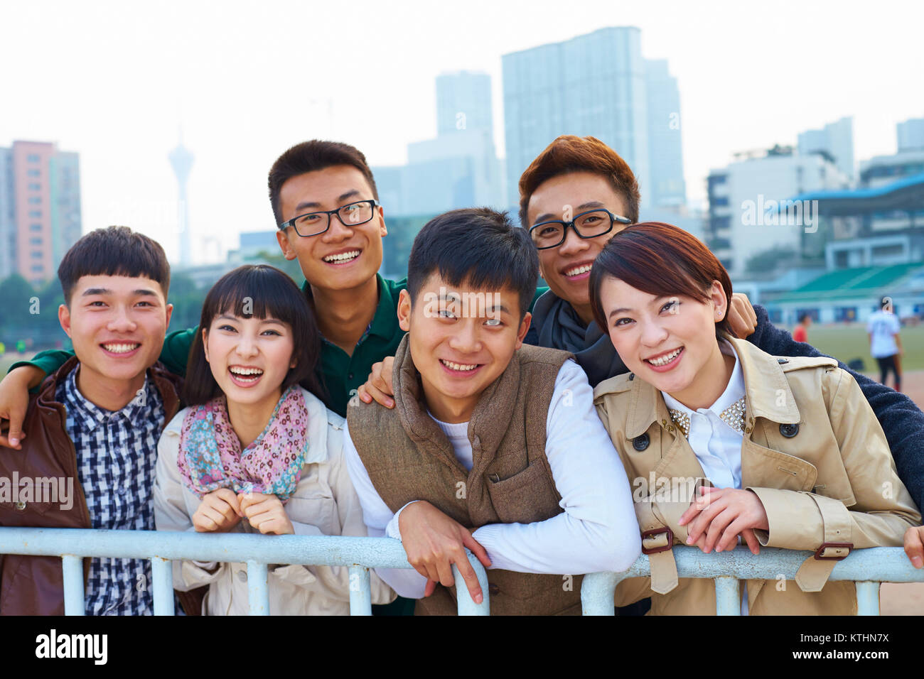 group of happy asian college students looking at camera smile in the ...