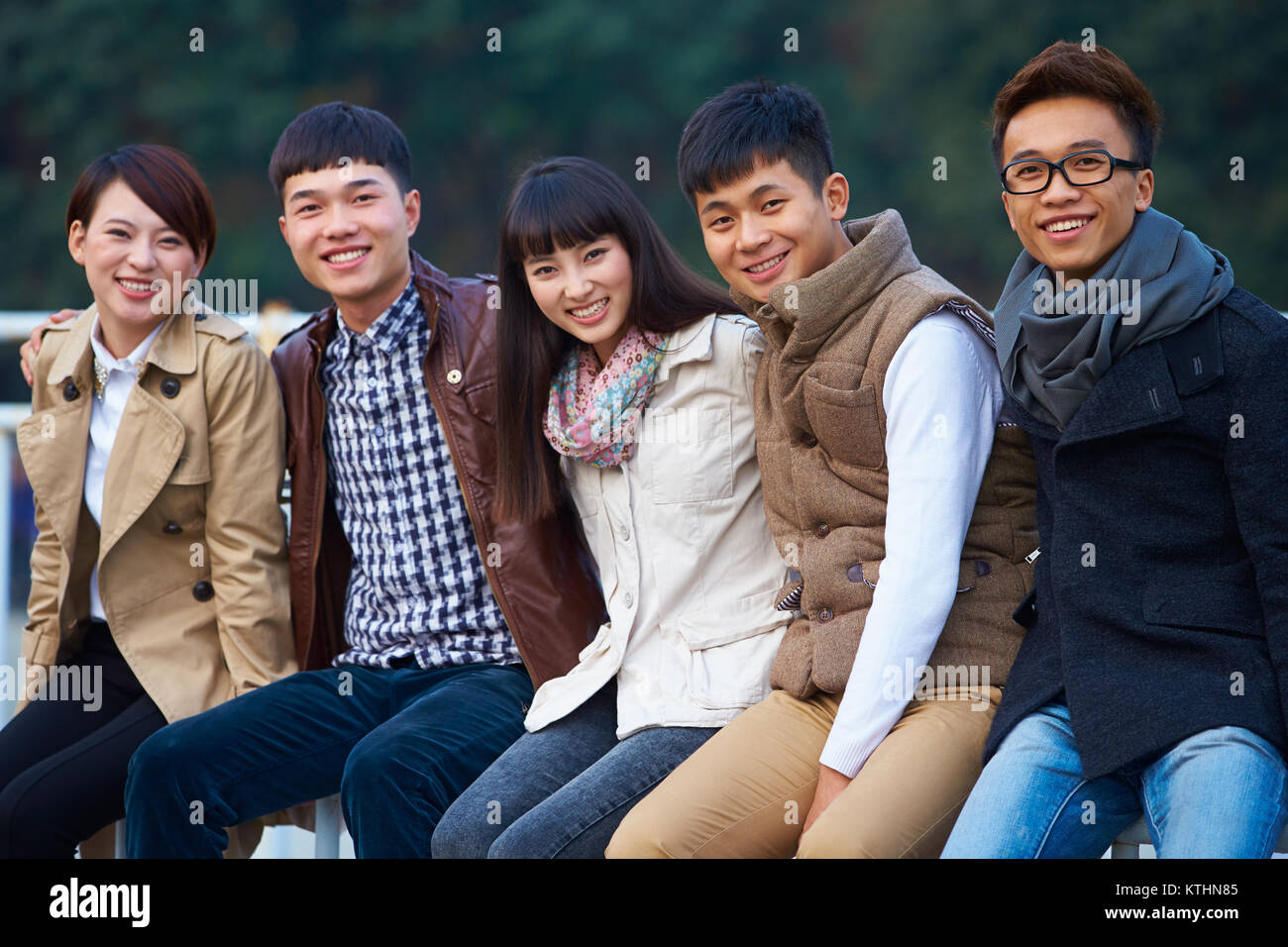 group of happy asian college students looking at camera smile in the ...