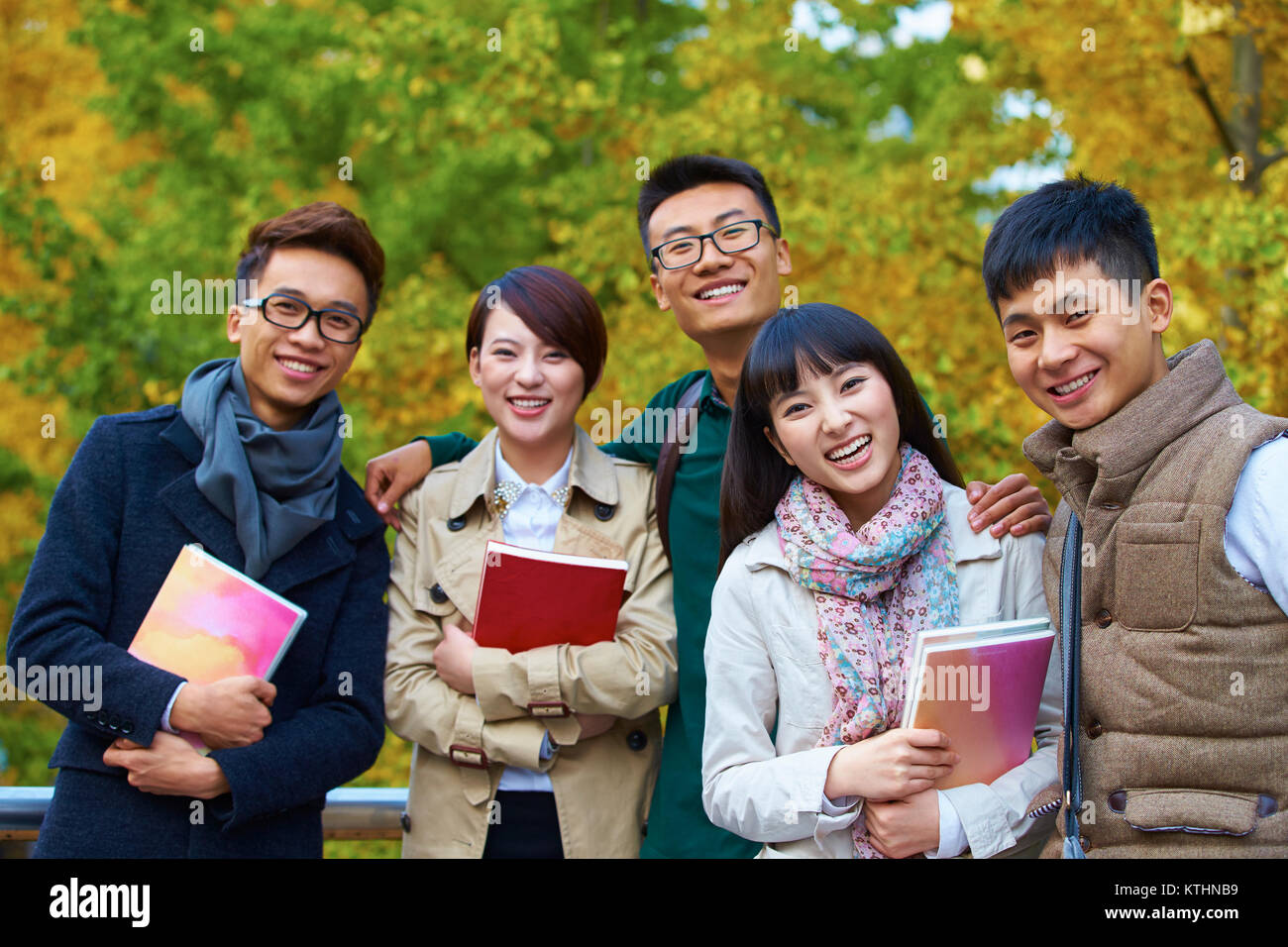 group of happy asian college students looking at camera smile in the ...