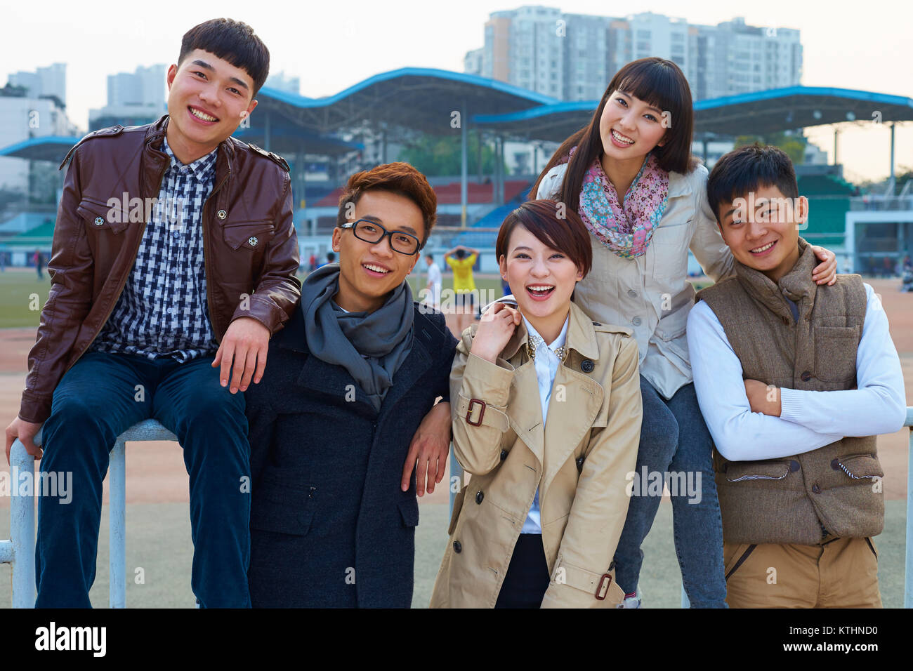 group of happy asian college students looking at camera smile in the ...