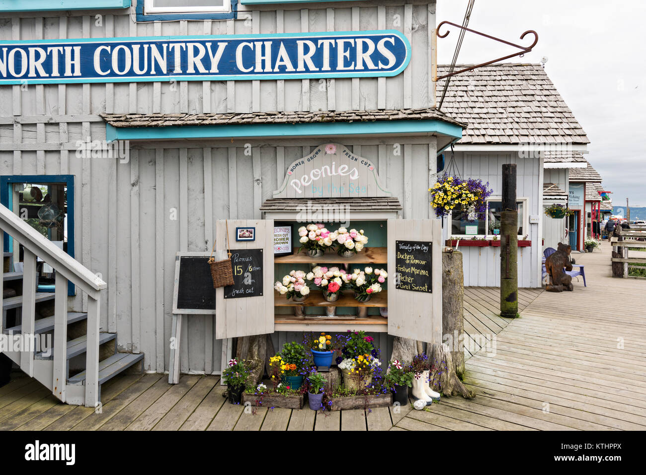 Cute flower shop selling locally grown peonies along the marsh