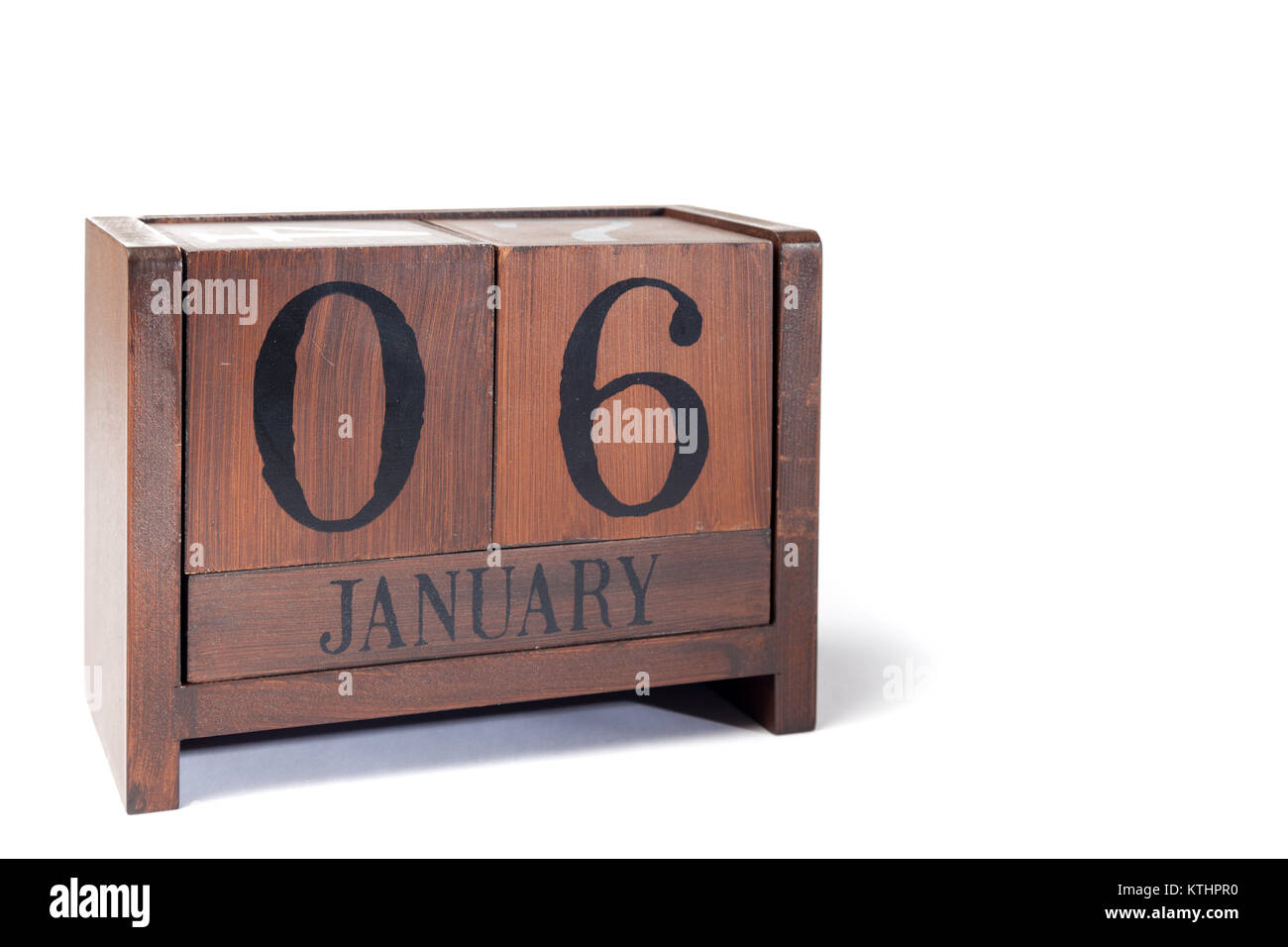 Wooden Perpetual Calendar set to January 6th Stock Photo