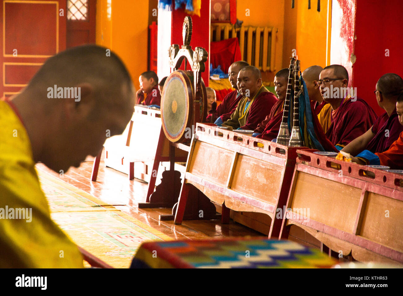 Monks having service in Gandan monastery. Ulaan-Baatar, Mongolia. Stock Photo
