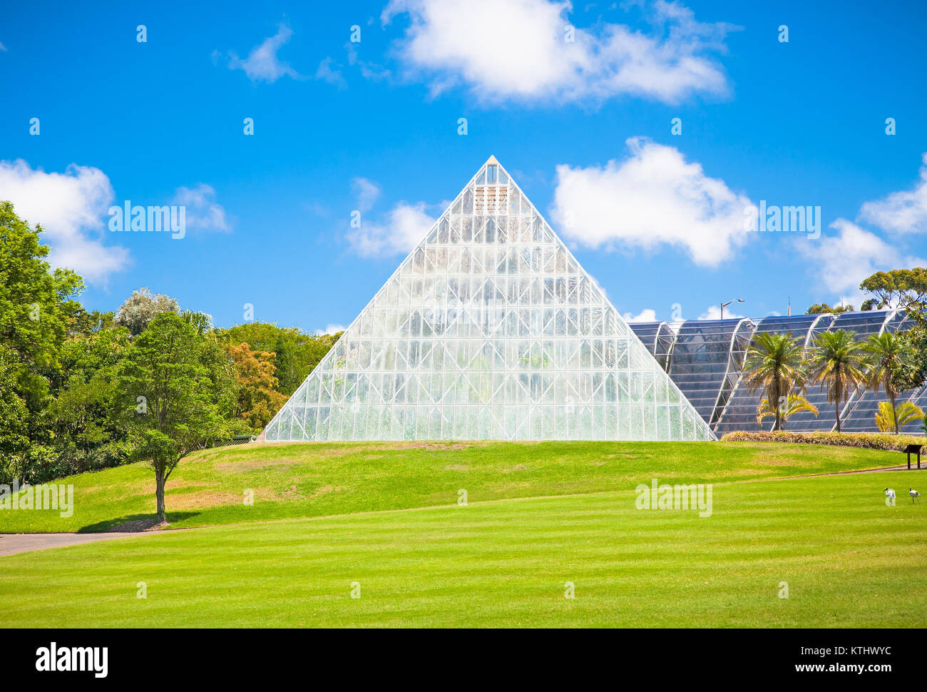 SYDNEY,AUSTRALIA-JAN 6, 2015:Pyramid with glass and steel facadeon Jan 6 2015 in Palm Cove, Royal Botanic Gardens in Sydney, Australia. Stock Photo