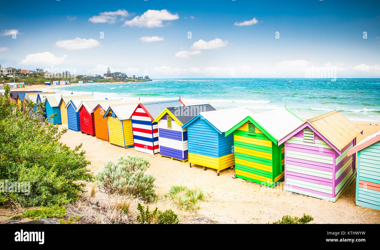 Beautiful Bathing houses on white sandy beach at Brighton beach in Melbourne, Australia. Stock Photo