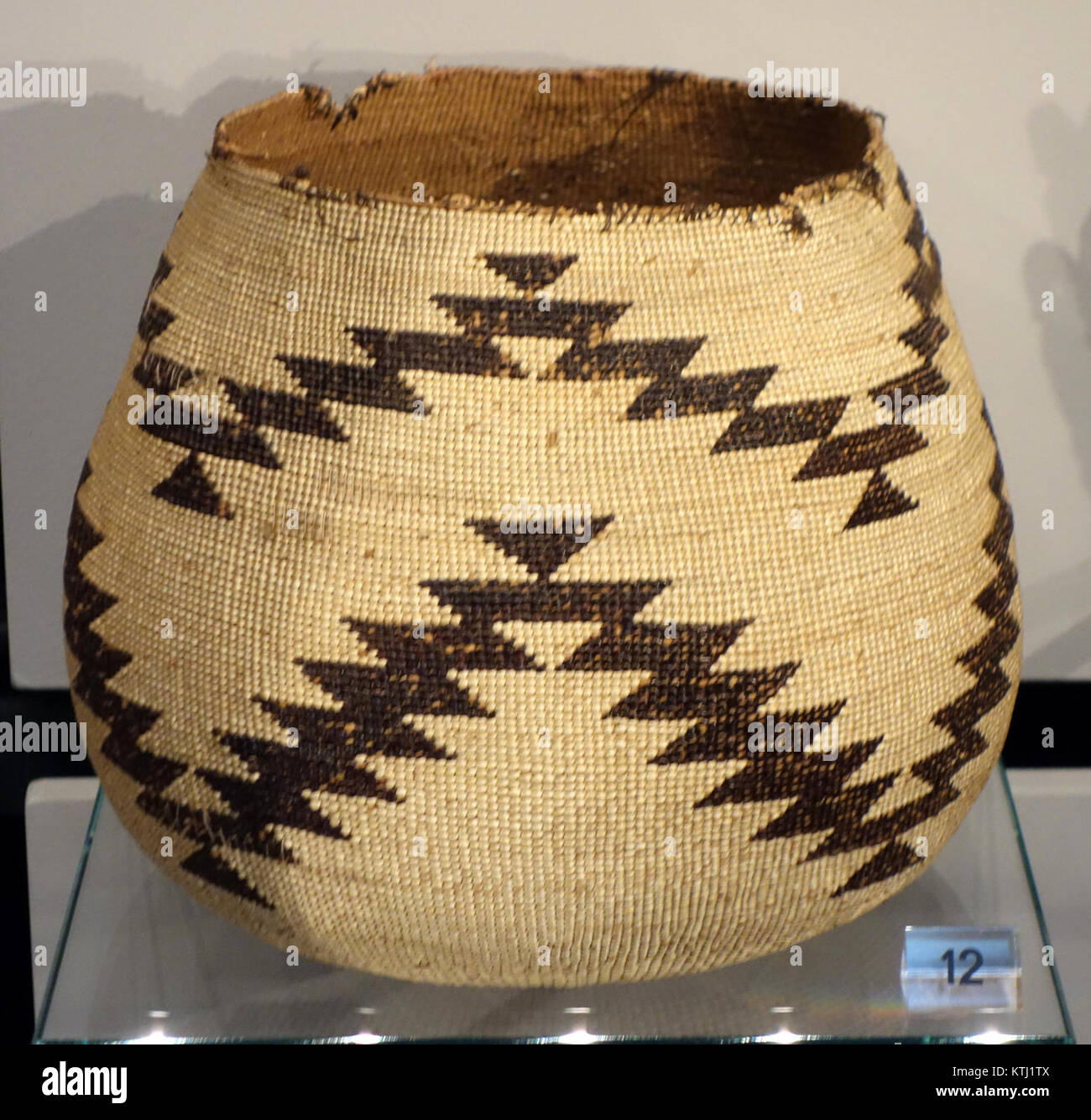 Basket, Hupa people, Southern California, late 19th to early 20th century, twined tule root and bear grass   Chazen Museum of Art   DSC01863 Stock Photo