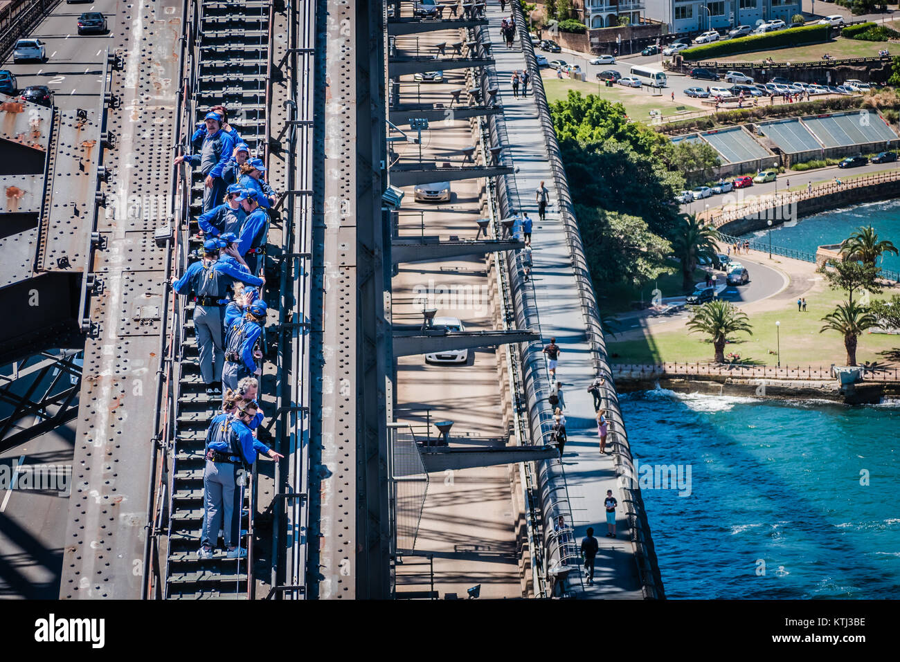 people walking on top of sydney harbour bridge Stock Photo