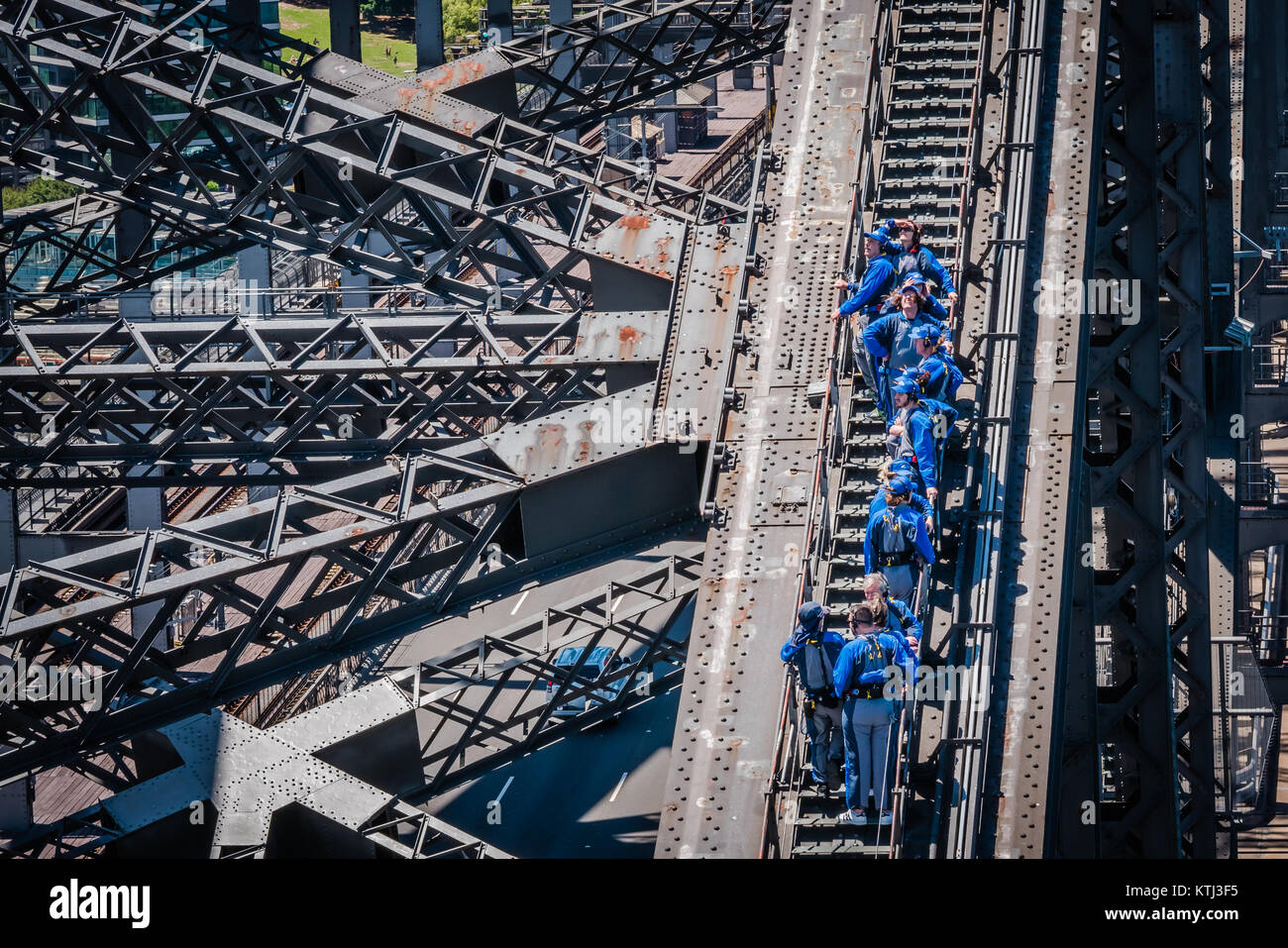 people walking on top of sydney harbour bridge Stock Photo